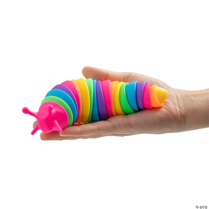 rainbow fidget sensory slug toy with pink head being held in someone's hand
