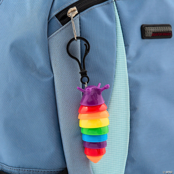 portable, rainbow fidget slug sensory toy backpack clip keychain on child's backpack
