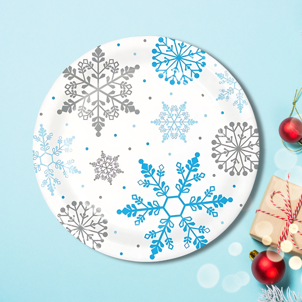 snowflake disposable dinner plates for winter parties, baby showers, snow princess themes, and holiday events with blue background