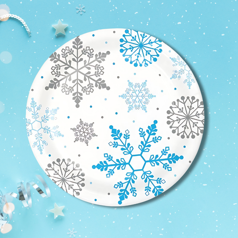 snowflake disposable dinner plates for winter parties, baby showers, snow princess themes, and holiday events with blue background