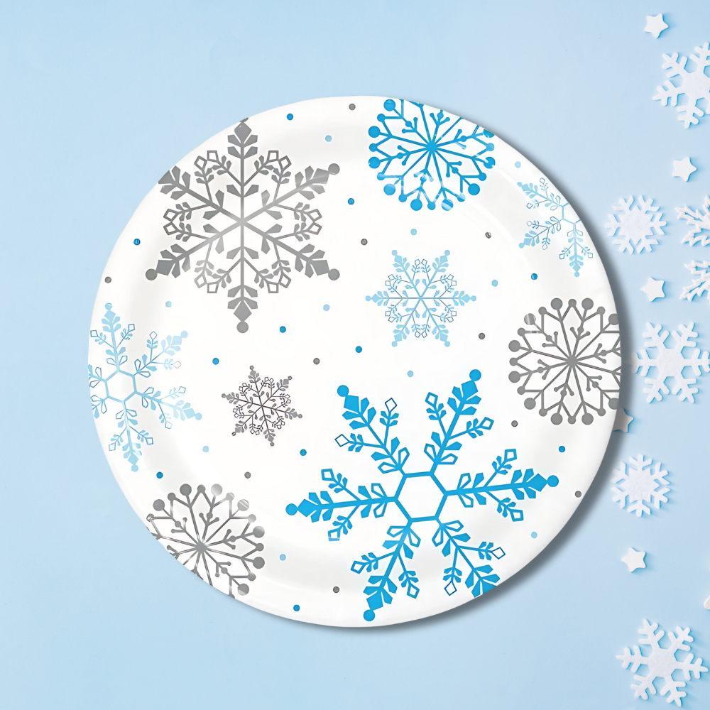 snowflake disposable dinner plates for winter parties, baby showers, snow princess themes, and holiday events with blue background